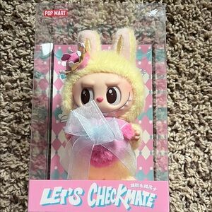 Let's Checkmate Yellow and Pink Bunny Figure